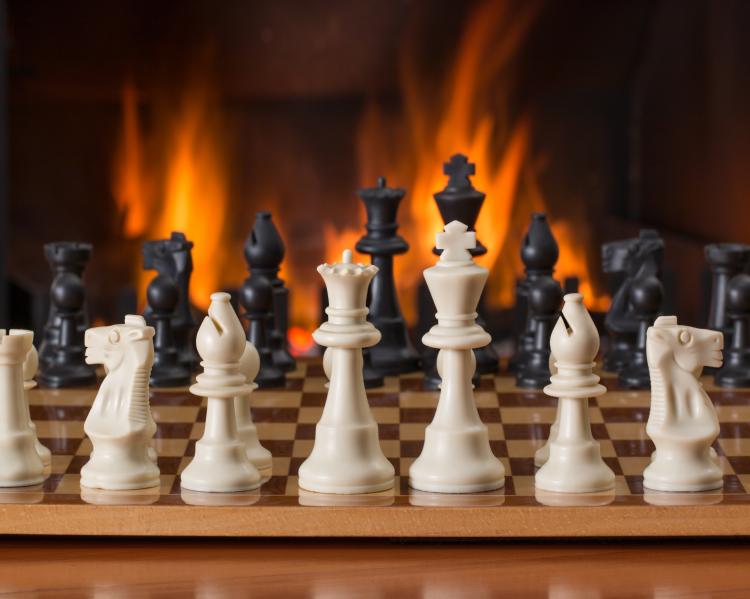 chess-board-game-fireside-strategy-wallpaper